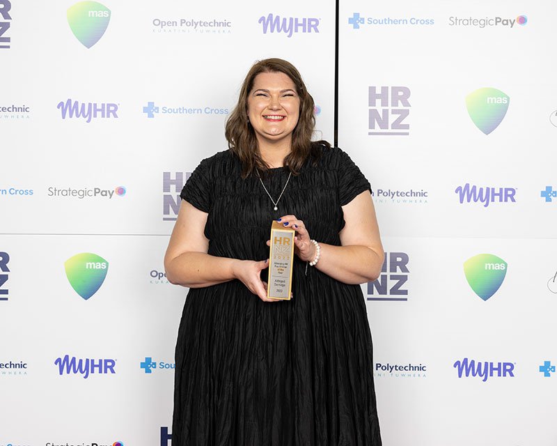 Abbigail Surridge with her Emerging HR Practitioner of the Year 2022 award