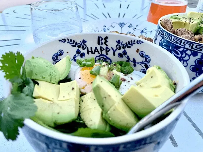 Bowl of avocado and an egg