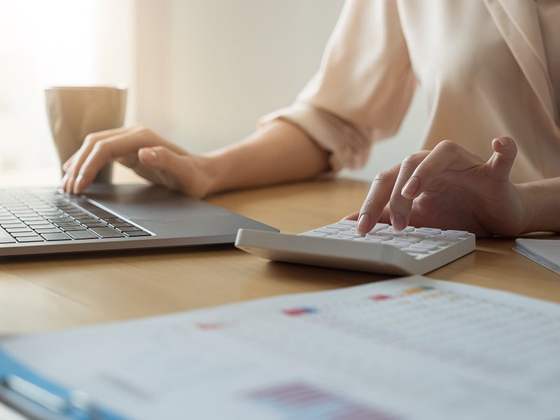 Person using a computer to check their tax rate online