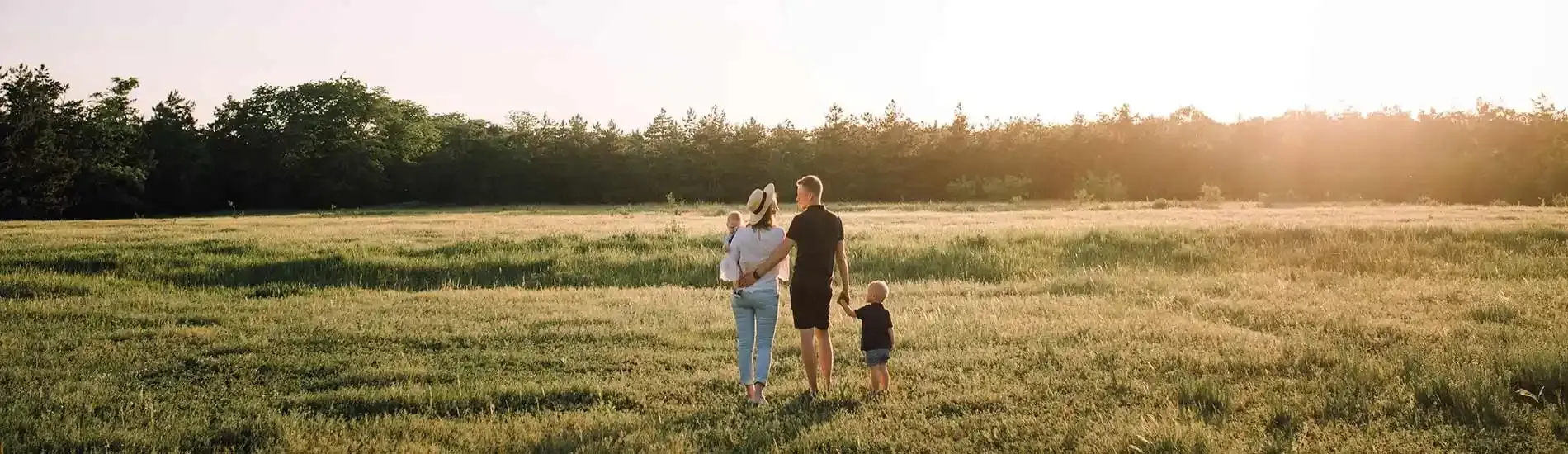 Family in a sunlit field