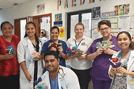 Jennifer Redshaw with a group in a hospital