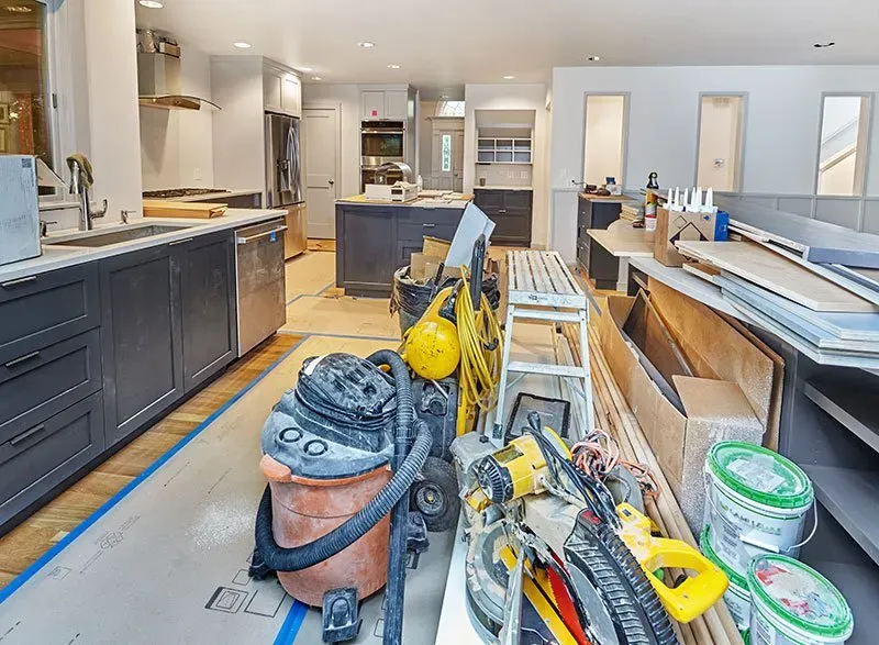 Kitchen building zone with tools and equipment sitting in the middle of the room