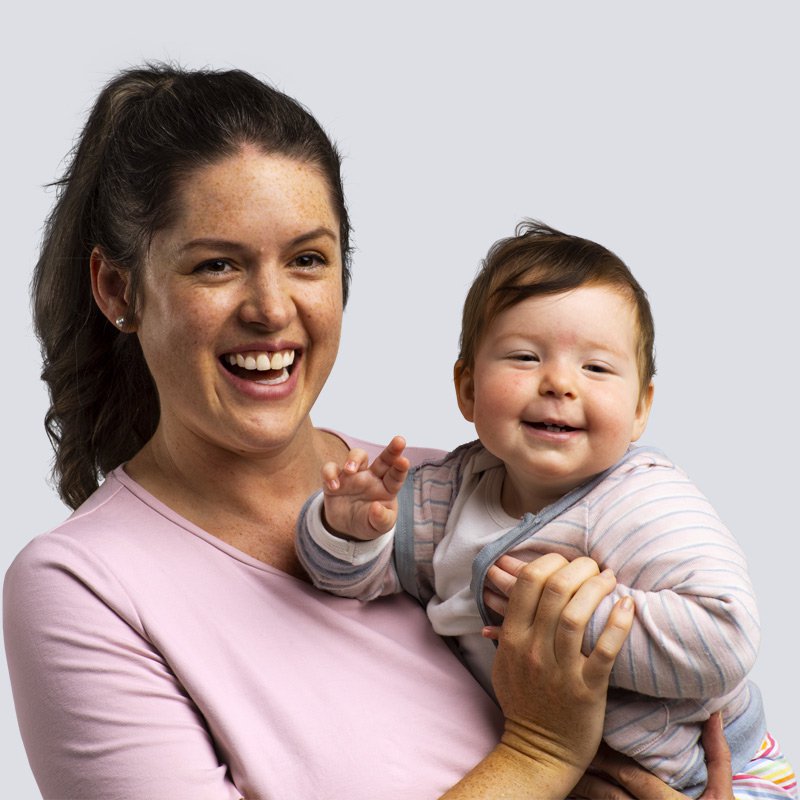 Portrait of MAS Member Katherine holding her child