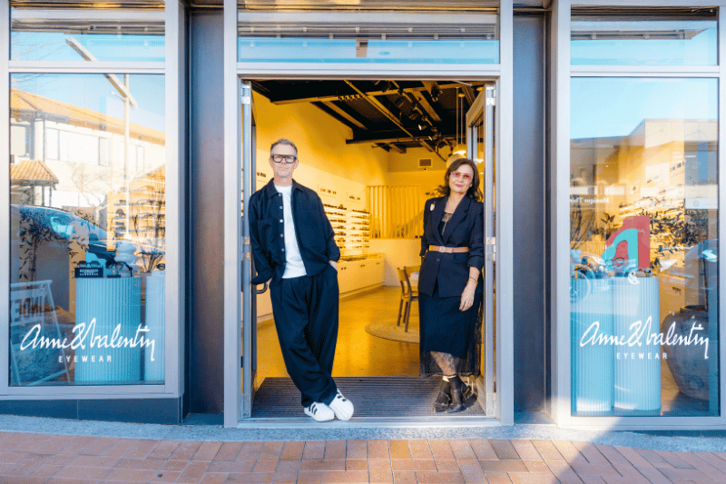 Geoff and Lynne Parker standing outside their shop