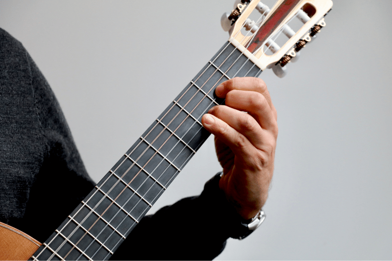 Dr Tom playing the guitar