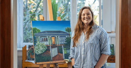 Sam Gilmour with a piece of her artwork