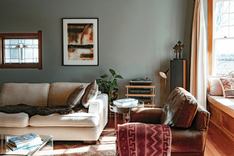 Inside the lounge, nice natural paint colours and leather furniture.