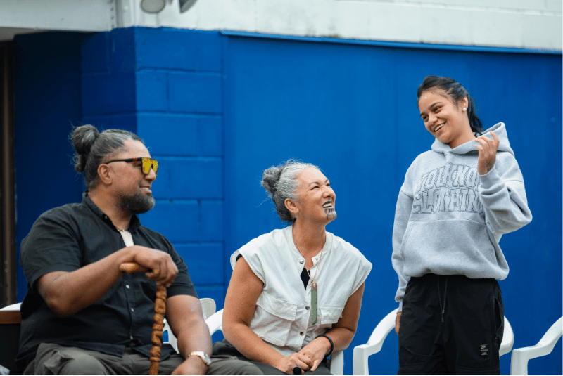 Kaumatua listening to teen speaking