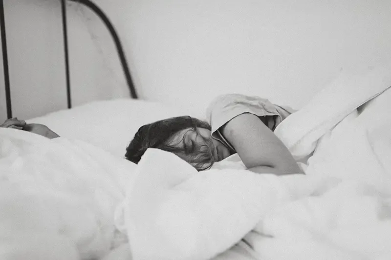 black-and-white-image-of-female-sleeping