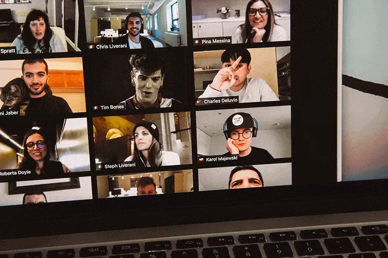 Group of employees having an online zoom meeting