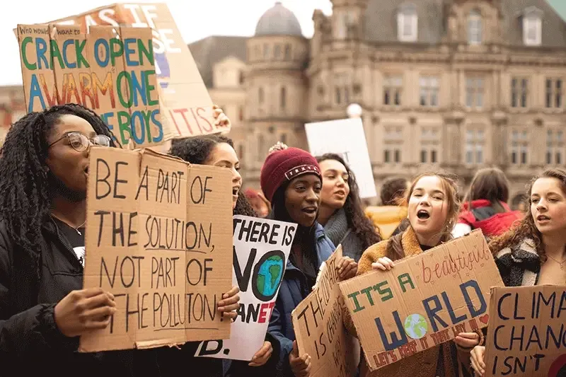 group-of-young-people-protesting-against-climate-change-with-signboards
