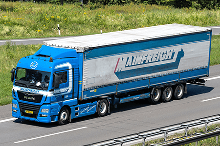 A mainfreight truck travelling on a highway