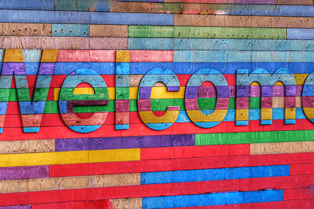 multicoloured-wooden-welcome-sign