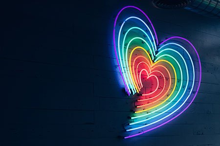 mutlicoloured-heart-LED-light-on-wall