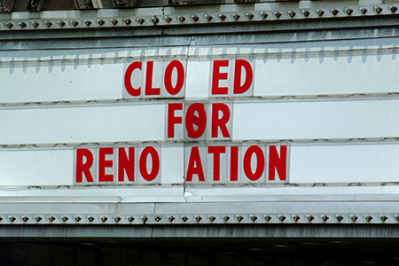 old-cinema-sign-with-text-closed-for-renovation-and-some-letters-missing