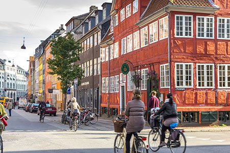 people-riding-bikes-along-the-streets-in-Copenhagen