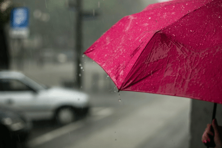 Umbrella with rain on it_compressed