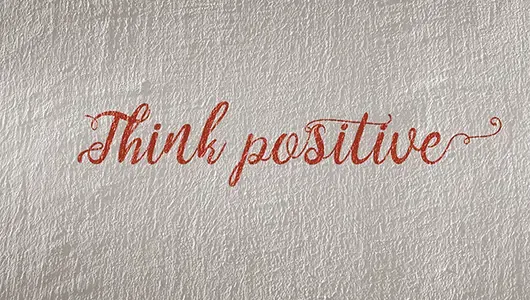 white-concrete-wall-with-text-&#39;think-positive&#39;-written-in-red-cursive-font-article
