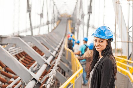 woman-on-construction-site-wearing-hard-hat-listing