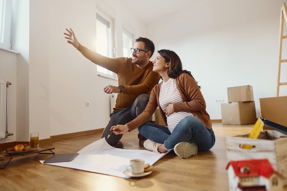 young couple in their new home